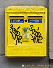 A grafittied postbox 